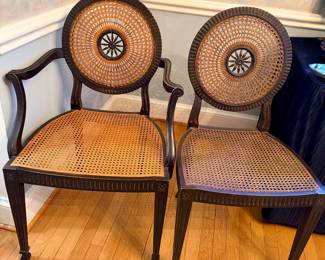 Cane Seat Dining Chairs.  (4) Arm Chairs and (4) Side Chairs available. In the style of Maitland Smith. 