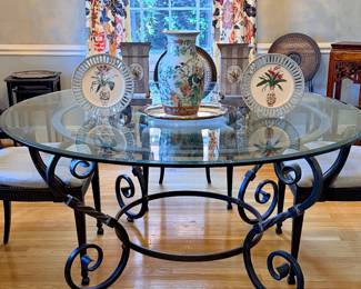 Round glass topped dining table