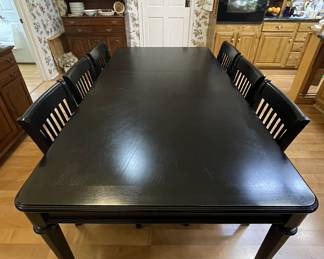 Large Solid Wood Farm Table in a warm Black Paint finish.
1 leaf. 6 chairs