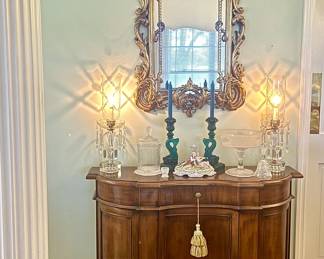 Elegant vintage cabinet with a Serpentine front.
3 drawers and 3 door, open cabinet space for lots of storage.