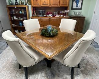 Holiday Room-
Wonderful 1980s Oak Pedestal table. Waterfall edge profile with a Brass Strip.
Butterfly match tabletop with Glass protector.