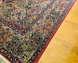 Close up of Karastan Wool Rug in bedroom.