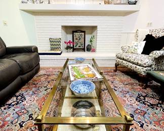 Vintage Brass and Stone Coffin table
Beveled glass top inserts.
Crema Marfil Marble bottom