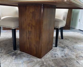 Wonderful 1980s Oak Pedestal table. Waterfall edge profile with a Brass Strip.
Butterfly match tabletop with Glass protector.
