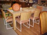 Mid-century modern laminate table with 6 chairs has pink vinyl seat cushions, $325