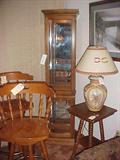 Lighted curio in the corner, pair of 30" bar stools.
