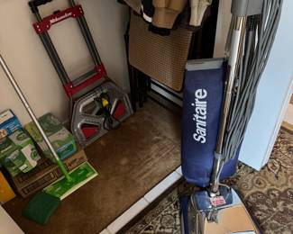 commercial Sanitaire vac and other house hold cleaners and supplies not shown