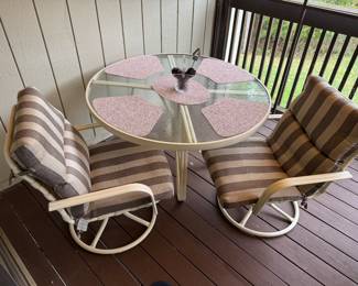 Outdoor table and has four chairs