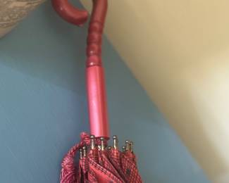 antique umbrella with a cutest curled handle 