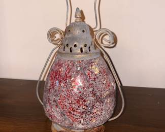 Vintage lantern with cracked glass