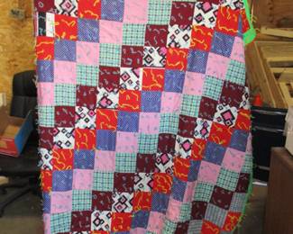 several quilts and comforters 