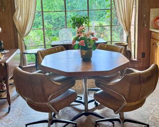 Mid century Formica top table and vinyl chairs