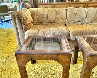 One of pair of mid century glass top end tables 