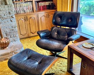 Mid-Century Canadian Eames-Style Lounge Chair and Ottoman
— molded walnut shell, black leather cushions, swivel base, made in Canada circa 1960s–70s.