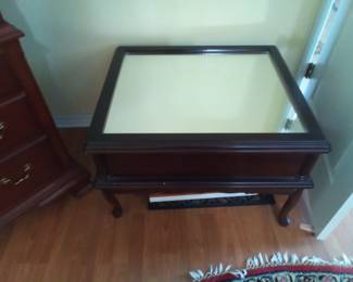 Mirrored table,containing a Nativity set