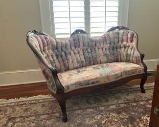 Victorian tufted sofa.