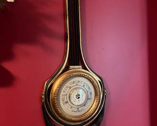 Wall hanging barometer.