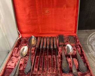 Silver utensils in velvet lined box $160 + tax