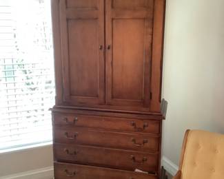 Large armoire with drawers and shelving. Presale $175