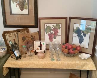 Gorgeous signed grape pictures, wine rack, fruit, pillows and glasses….all wine genre
