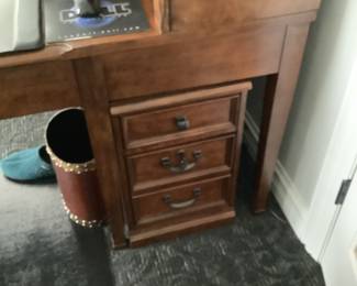 Three drawer file cabinet that fits under the end of the desk