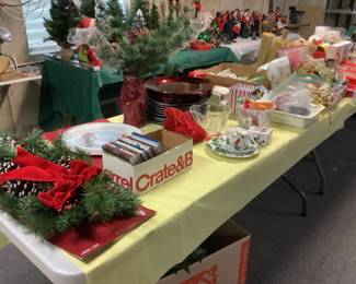 Large selection of Christmas items, charger plates, greenery, paper goods
