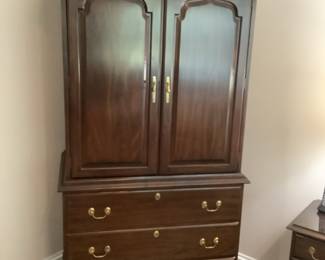 Large armoire with shelving and drawers