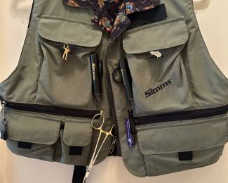 Many fishing vests 