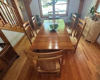 Dining table with six chairs  table shown with two leaves in it