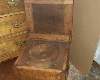 Oak commode with French enamelware pot