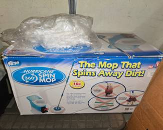 New spin mop with extra replacement mop heads. Plus loads of cleaning supplies. Windex, pledge, zep, multipurpose cleaners.