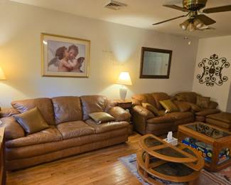 Sealy 4 piece leather sofa, love seat,
Chair with ottoman. Plus 5 pillows
