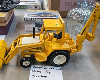 VINTAGE INTERNATIONAL METAL TOY BACKHOE