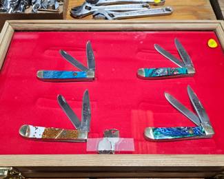 KNIVES IN DISPLAY CASE