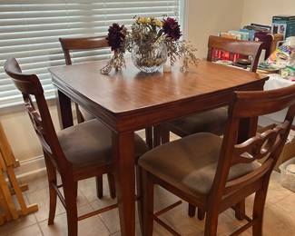 high top table and chairs, cookbooks