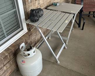 folding tables, propane tank
