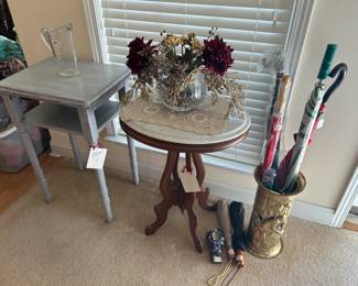 marble top table, umbrella stand, umbrellas, painted telephone table