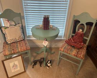 metal chairs and table, boston Terriers, antique doll, needlepoint pillow, books, bookends