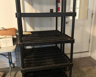 2 plastic shelf units