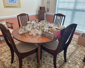 Queen Anne dropleaf table with 2 leaves and pad, 6 chairs that don't really match but were used with it, nice rug