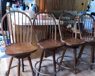 4 vintage solid wood barstools that swivel