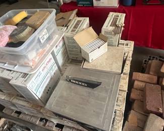 house tile, we have a tile saw, grouting tools,etc all you need to proceed on your own project