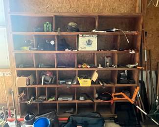 each slot is filled with a tool, part, great item…. Knee pads, grease gun, car water, saw, etc, come and get it!!!
