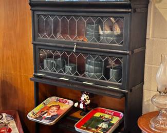 Barrister bookcase (contents not included), two beveled sections; more Coca Cola memorabilia
