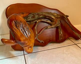 Hand carved wooden manatee hanging art