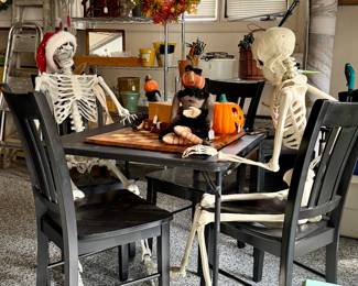 What sale is complete without a few life size skeletons playing poker?