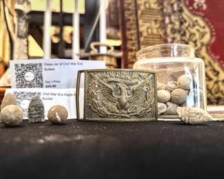 Civil war era eagle belt buckle and bullets.
