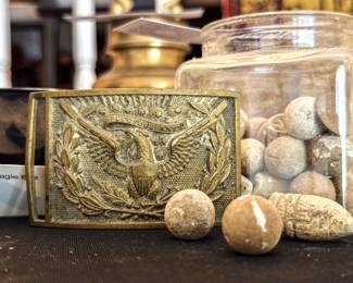 Civil war era eagle belt buckle and bullets.