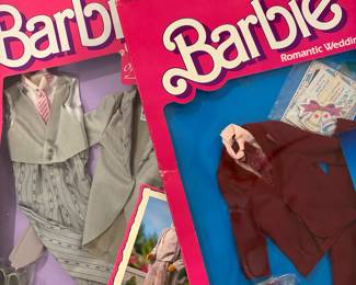 Ken and Barbie clothing new in original boxes