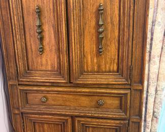 Vintage MCM tall cabinet with storage drawers